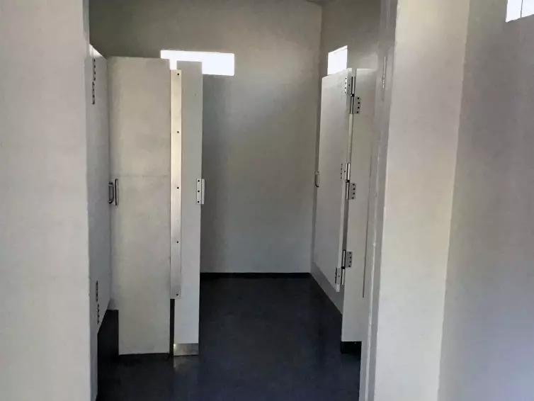 Taos multiuser restroom interior.